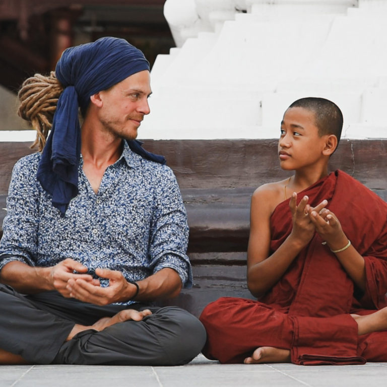 Pejan learning meditation with a novice in Yangoon, Myanmar