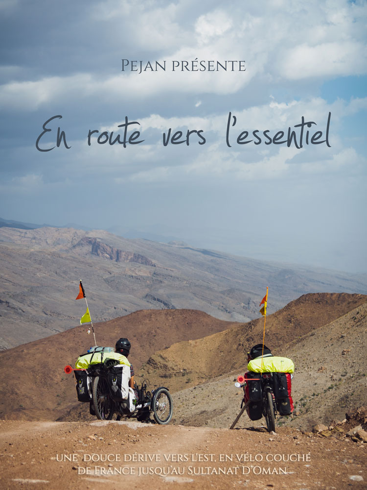 Poster for the film "En route vers l'essentiel" directed by Pejan. The film tells the story of a journey by recumbent bike across Europe and the Middle East, a gentle drift towards the East from France to the Sultanate of Oman.